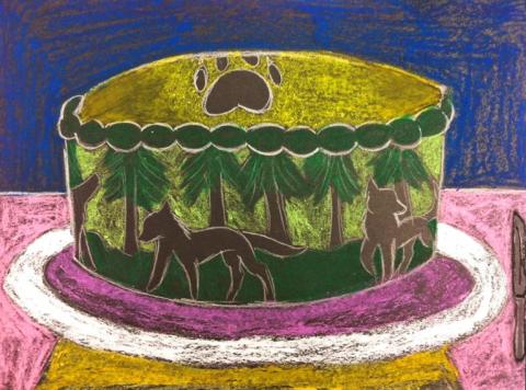 cake decorated with wolves and forest scene